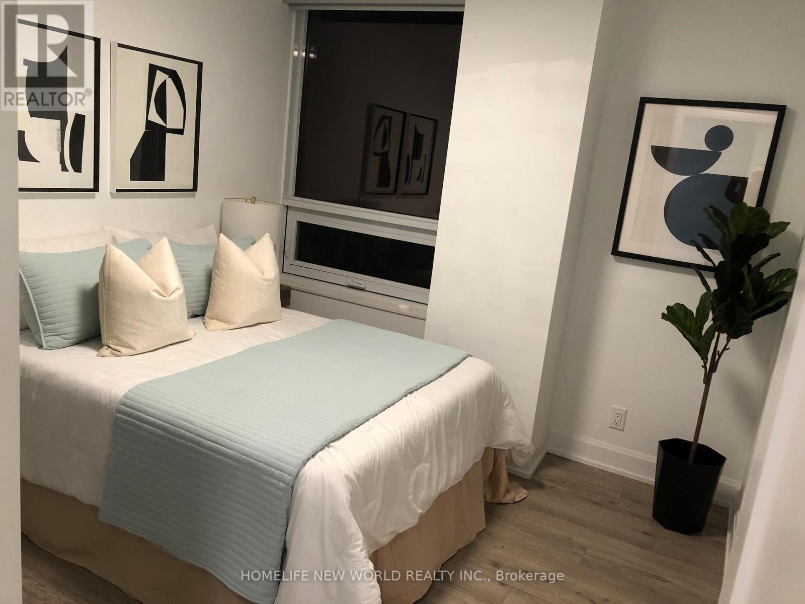 303 - 18 Water Walk Drive, Markham, Ontario  L3R 6L5 - Photo 5 - N12380024