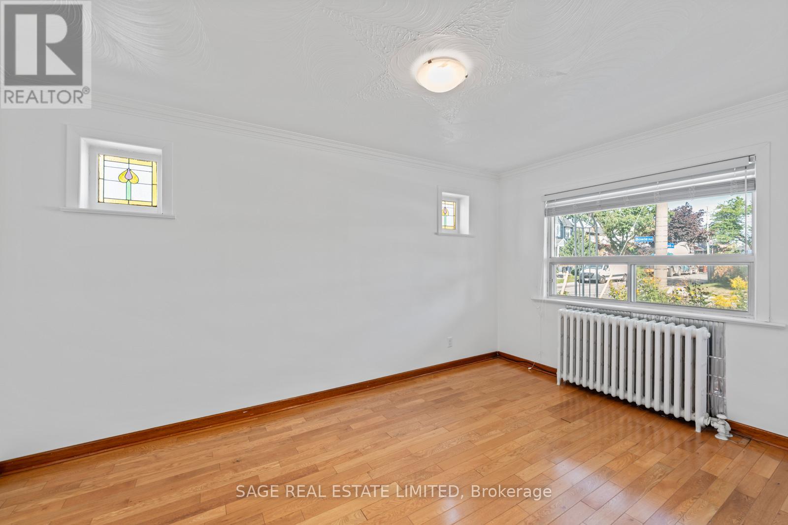 49 Bowie Avenue, Toronto, Ontario  M6E 2P2 - Photo 7 - W12380064