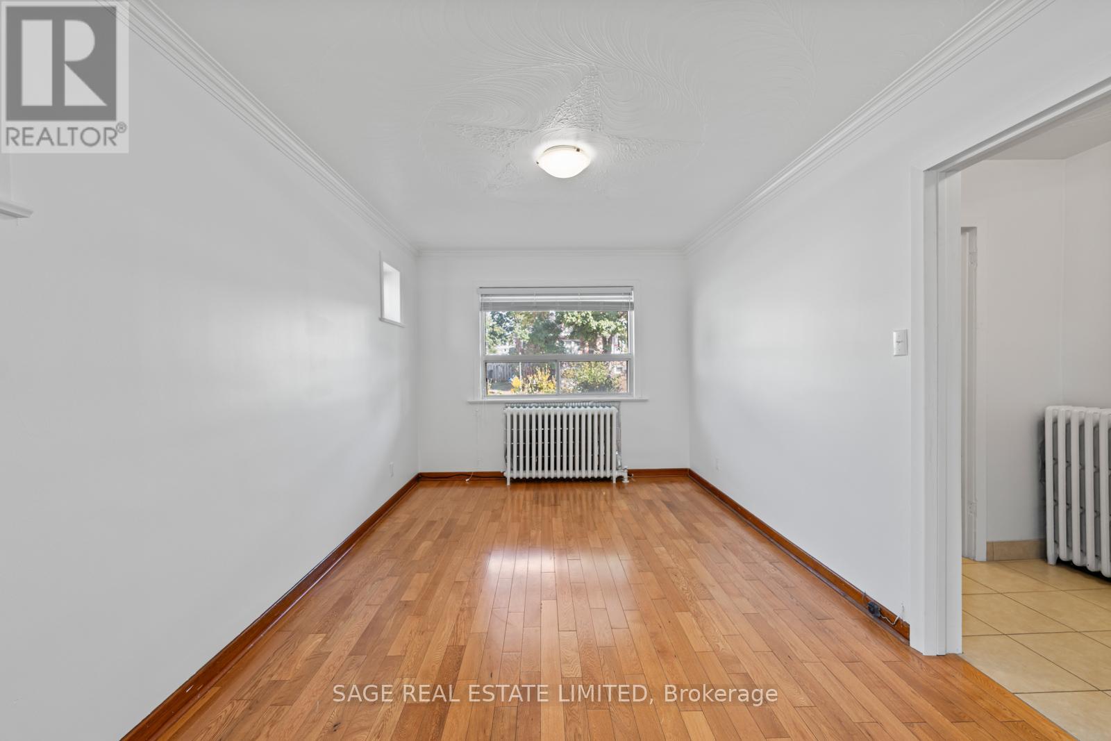 49 Bowie Avenue, Toronto, Ontario  M6E 2P2 - Photo 8 - W12380064