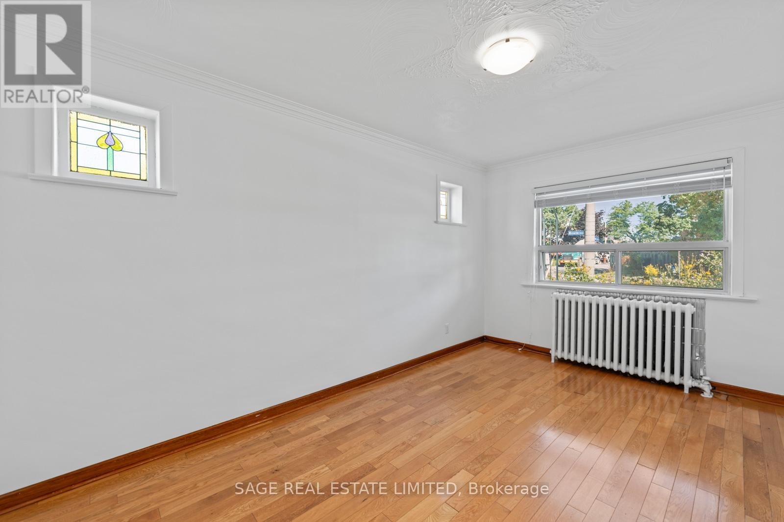 49 Bowie Avenue, Toronto, Ontario  M6E 2P2 - Photo 9 - W12380064