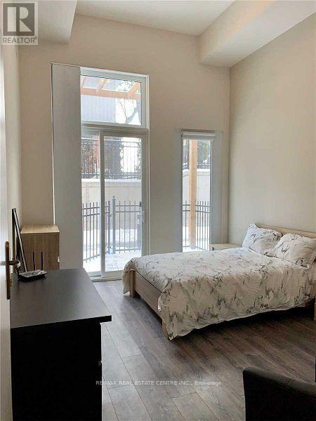 102 - 253 Albert Street, Waterloo, Ontario  N2L 3T7 - Photo 1 - X12380229