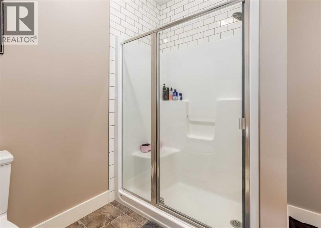 72 Rockcliff Grove Nw, Calgary, Alberta  T3G 0C8 - Photo 17 - A2248548