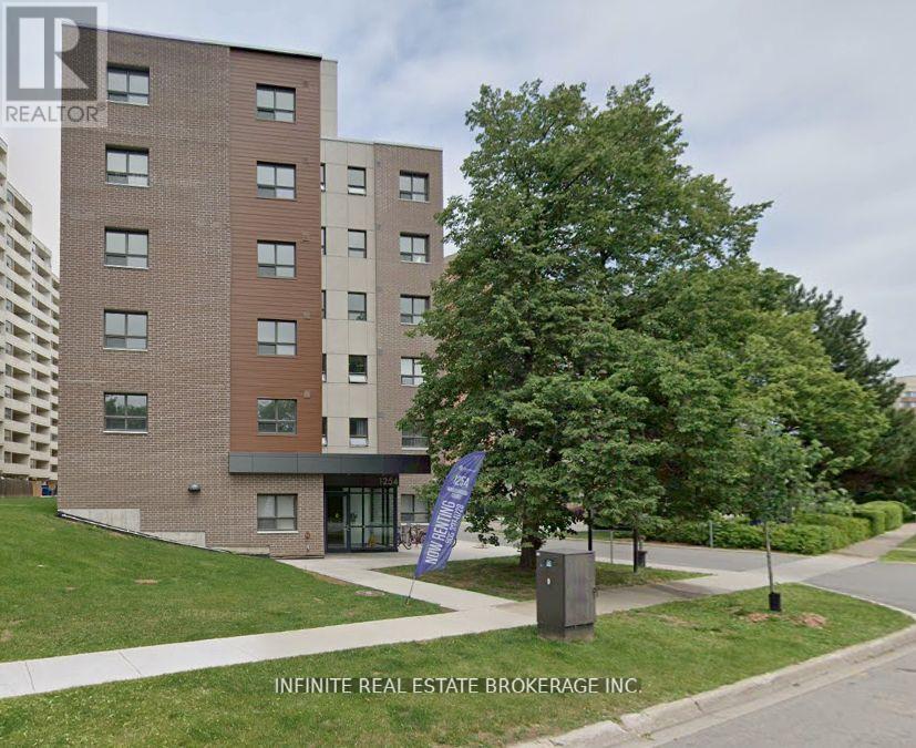 211 - 1254 Marlborough Court, Oakville, Ontario  L6H 7X6 - Photo 1 - W12380420