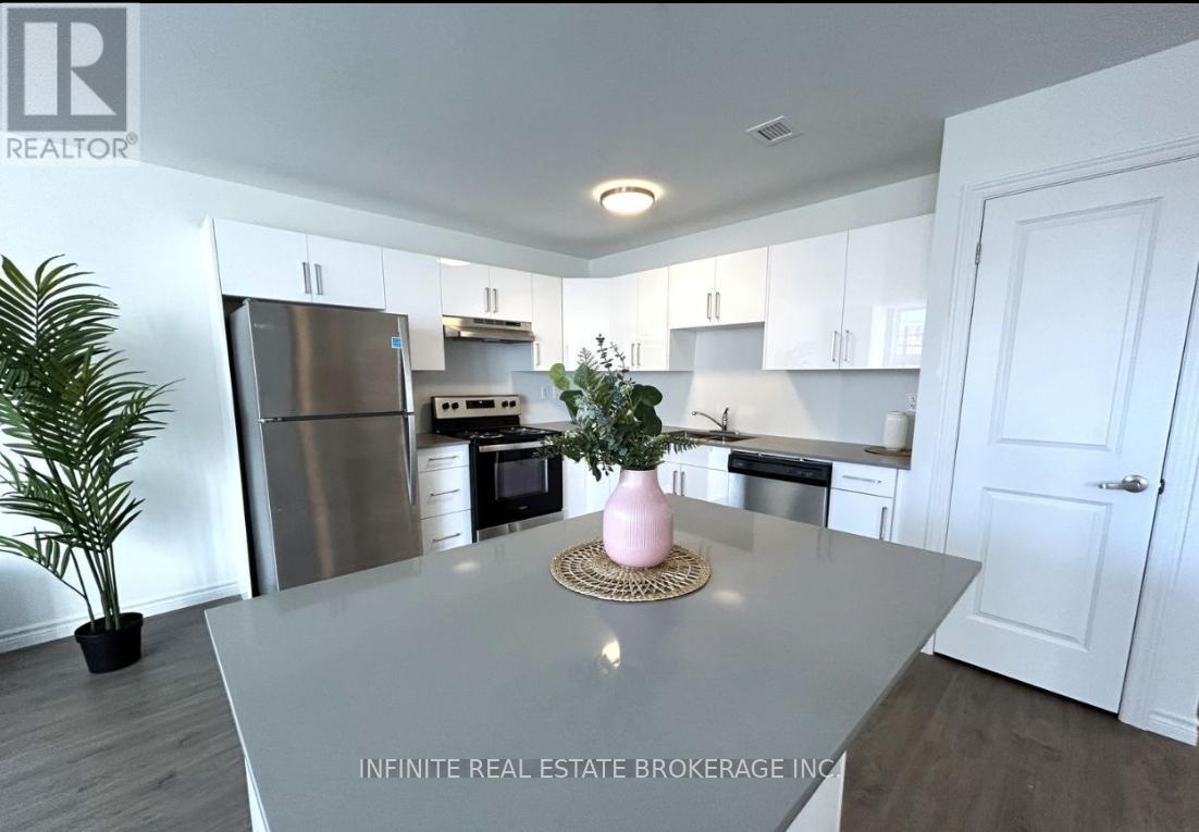 211 - 1254 Marlborough Court, Oakville, Ontario  L6H 7X6 - Photo 2 - W12380420