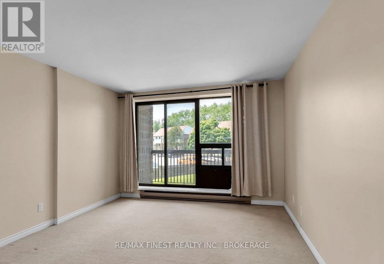 212 - 17 Eldon Hall Place, Kingston, Ontario  K7M 7H5 - Photo 3 - X12380925