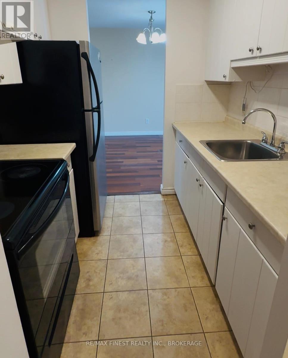 212 - 17 Eldon Hall Place, Kingston, Ontario  K7M 7H5 - Photo 4 - X12380925