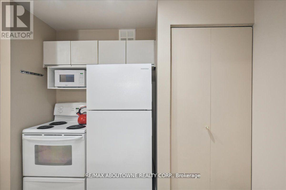 921 - 1450 Glen Abbey Gate, Oakville, Ontario  L6M 2V7 - Photo 8 - W12380872