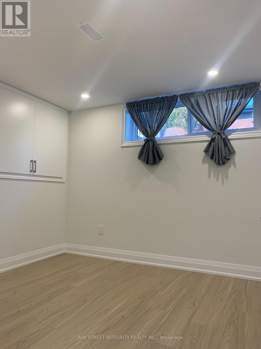 77 Wareside Road, Toronto, Ontario  M9C 3B5 - Photo 6 - W12380896