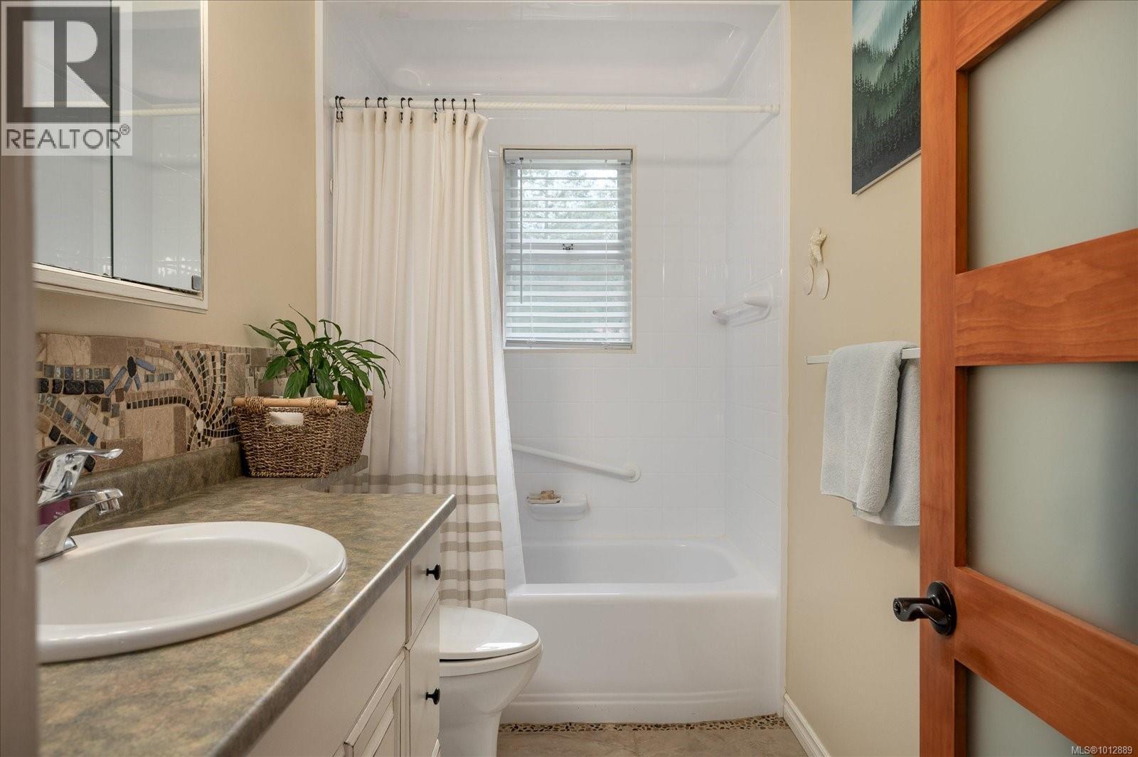 4800 Island Hwy W, Qualicum Beach, British Columbia  V9K 1Y9 - Photo 21 - 1012889