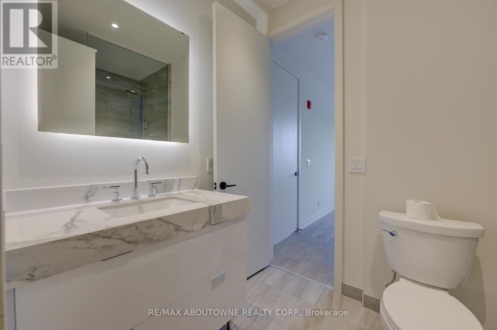 314 - 123 Maurice Drive, Oakville, Ontario  L6K 2W6 - Photo 13 - W12361183
