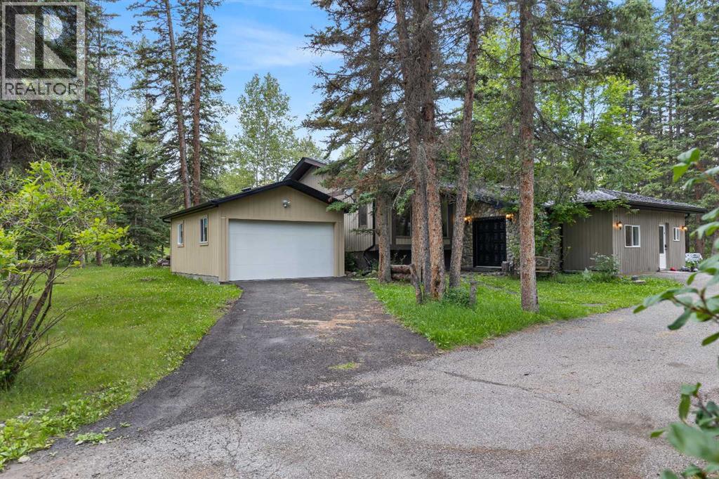 51 Redwood Meadows Drive, Rural Rocky View County, Alberta  T3Z 1A3 - Photo 2 - A2248955