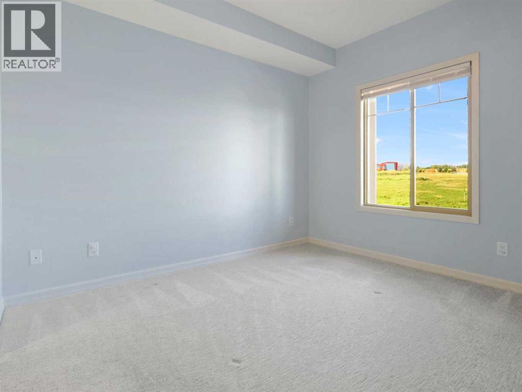 4306, 92 Crystal Shores Road, Okotoks, Alberta  T1S 1H5 - Photo 14 - A2250816