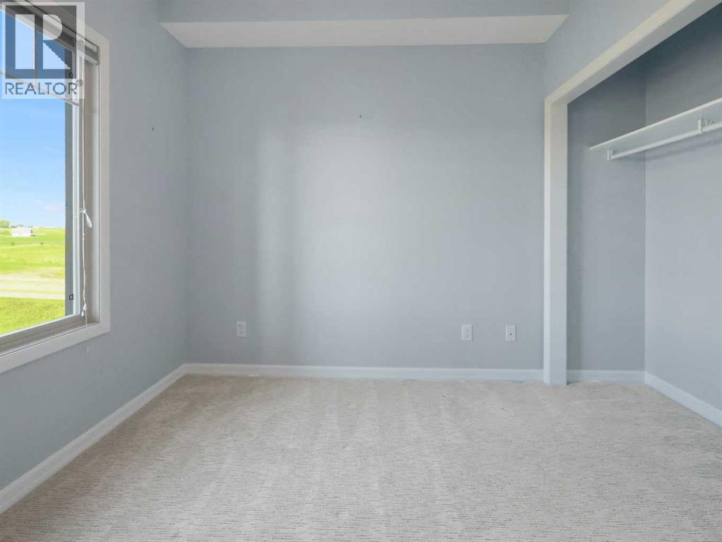 4306, 92 Crystal Shores Road, Okotoks, Alberta  T1S 1H5 - Photo 12 - A2250816