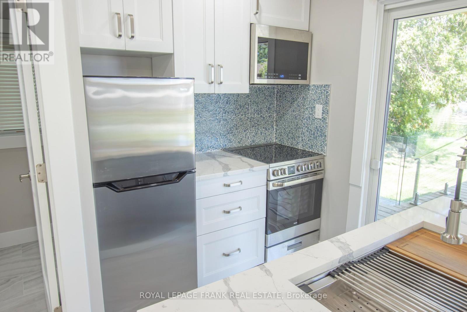 71 Falls Bay Road, Kawartha Lakes, Ontario  K0M 1A0 - Photo 13 - X12381926