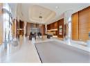 Lobby featuring wood walls