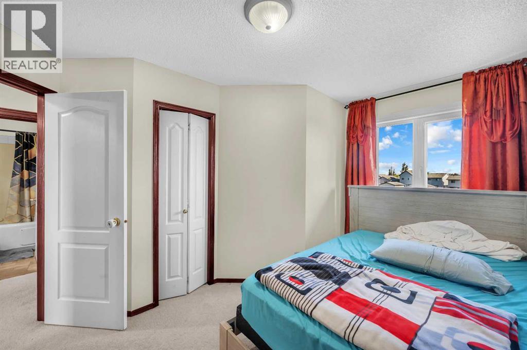 117 Douglas Ridge Circle Se, Calgary, Alberta  T2Z 3C2 - Photo 21 - A2253824
