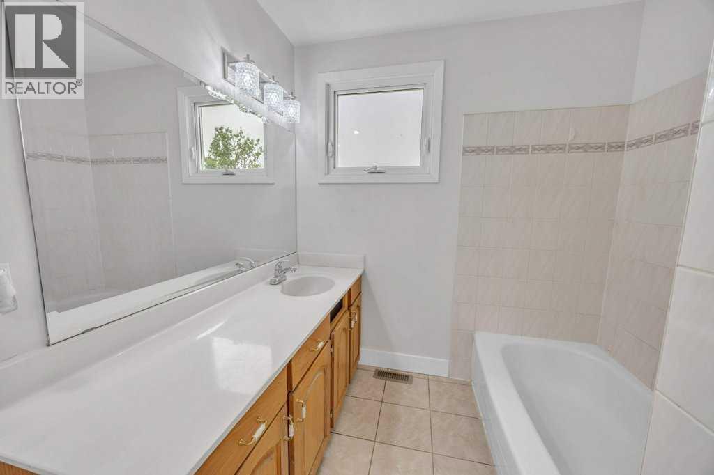 40 Pleasant Range Place, Rural Rocky View County, Alberta  T2H 1Y4 - Photo 28 - A2254174