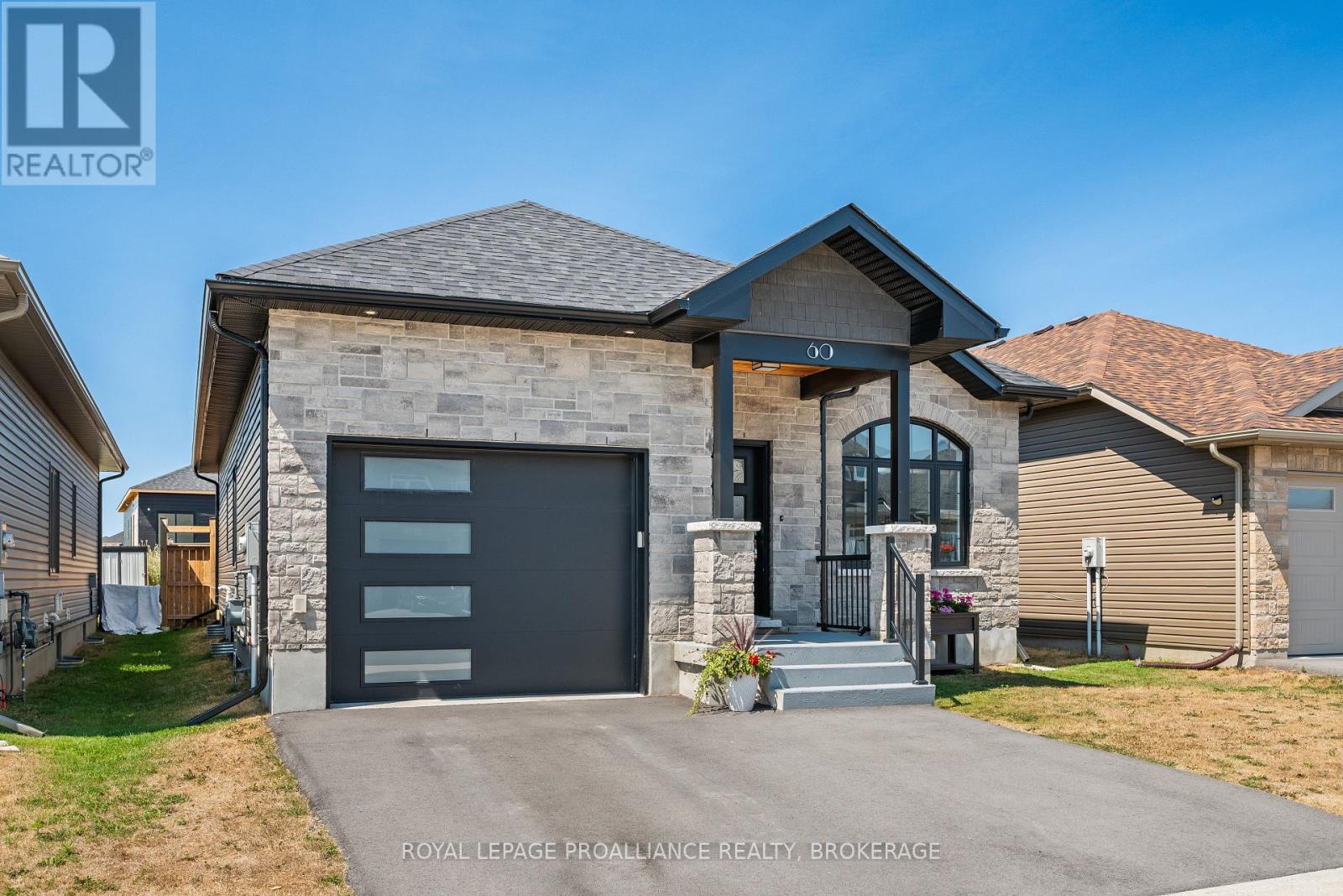 60 Potter Drive, Loyalist (Odessa), Ontario  K0H 2H0 - Photo 2 - X12383077