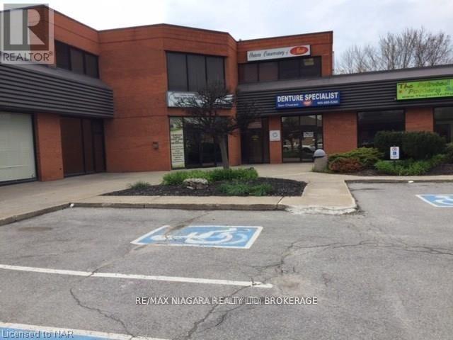 204 - 277 Welland Avenue, St. Catharines, Ontario  L2R 2P7 - Photo 2 - X12356811