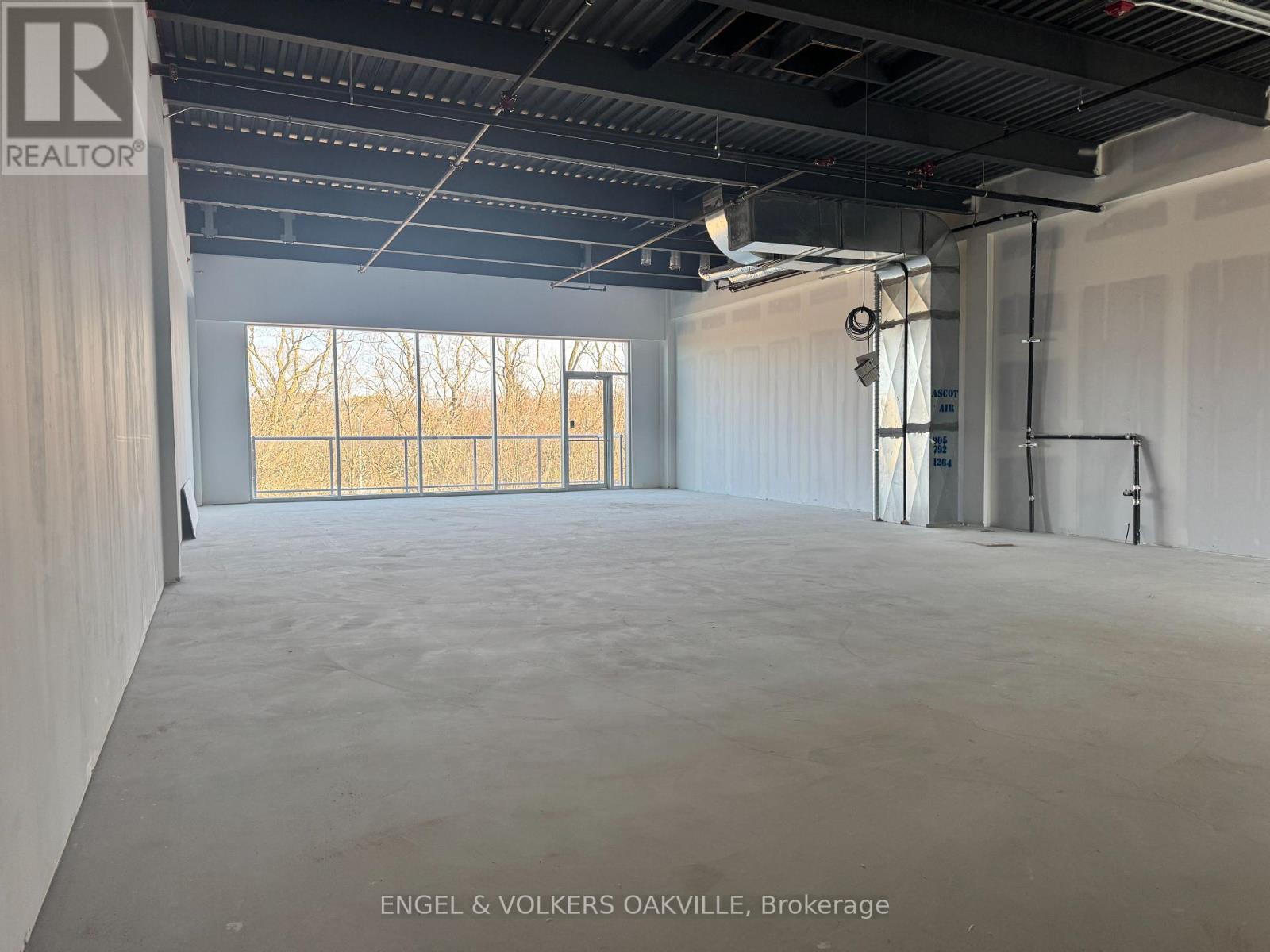 A208 - 1939 Ironoak Way, Oakville, Ontario  L6H 0N1 - Photo 10 - W12383112