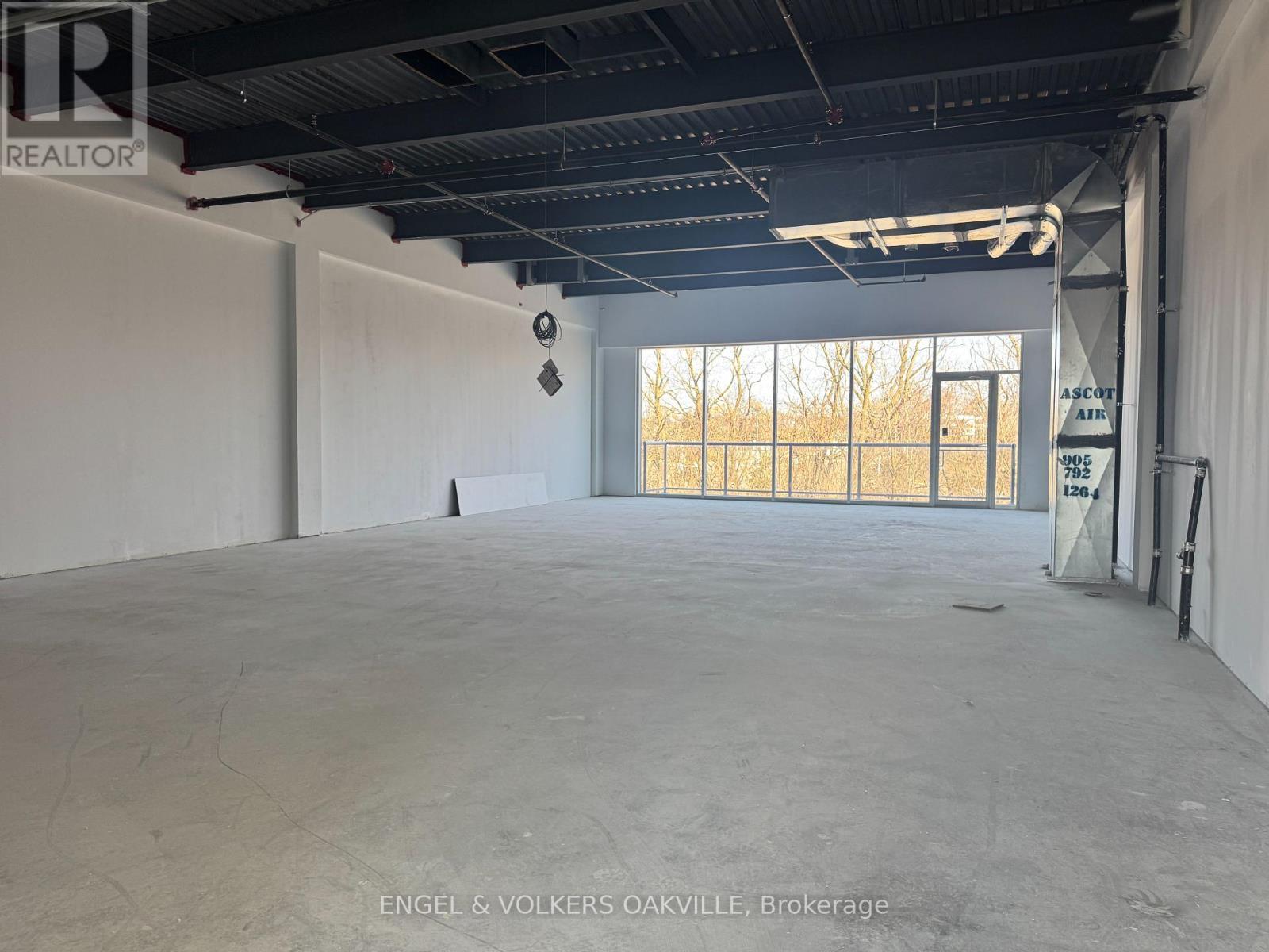 A208 - 1939 Ironoak Way, Oakville, Ontario  L6H 0N1 - Photo 4 - W12383112