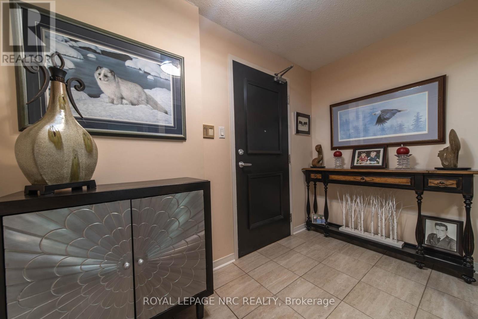 401 - 8111 Forest Glen Drive, Niagara Falls, Ontario  L2H 2Y7 - Photo 2 - X12383424