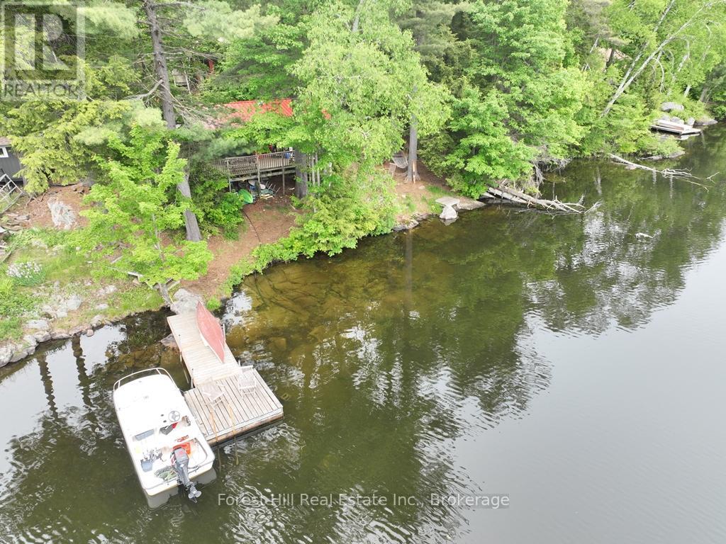 1293 Causeway Drive, Algonquin Highlands, Ontario  P0A 1E0 - Photo 11 - X12383469