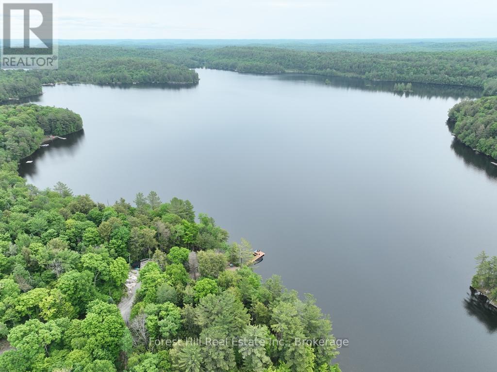 1293 Causeway Drive, Algonquin Highlands, Ontario  P0A 1E0 - Photo 7 - X12383469
