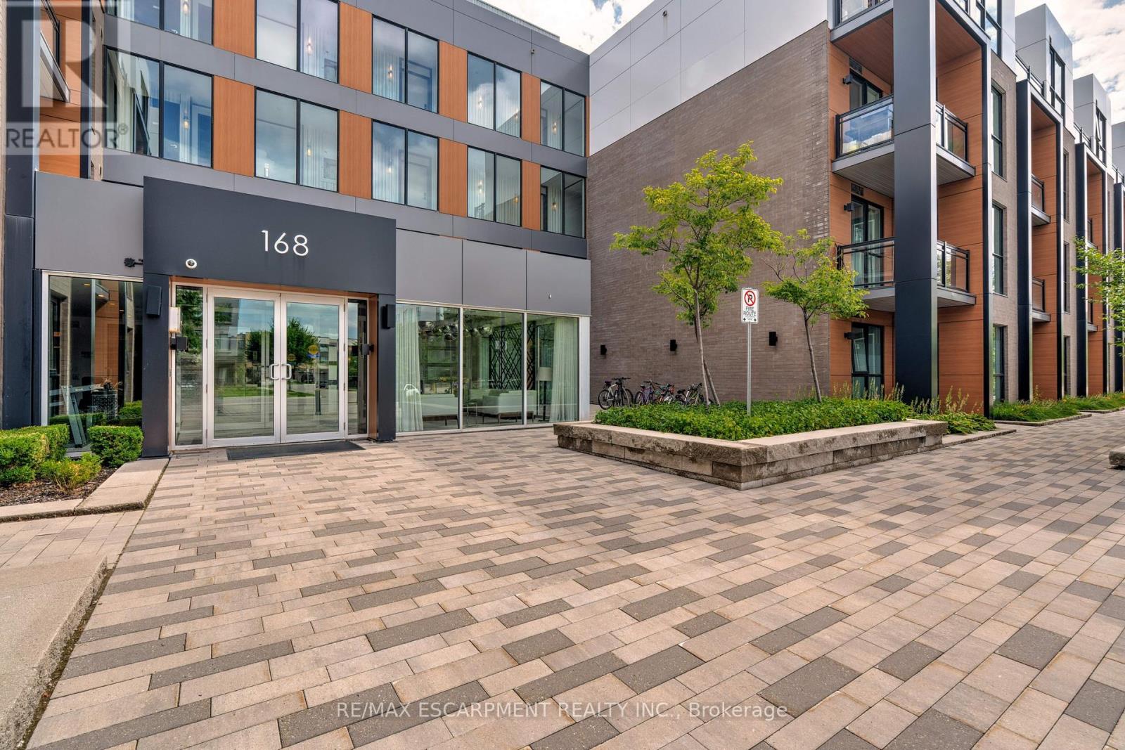 119 - 168 Sabina Drive, Oakville, Ontario  L6H 0W5 - Photo 2 - W12383341