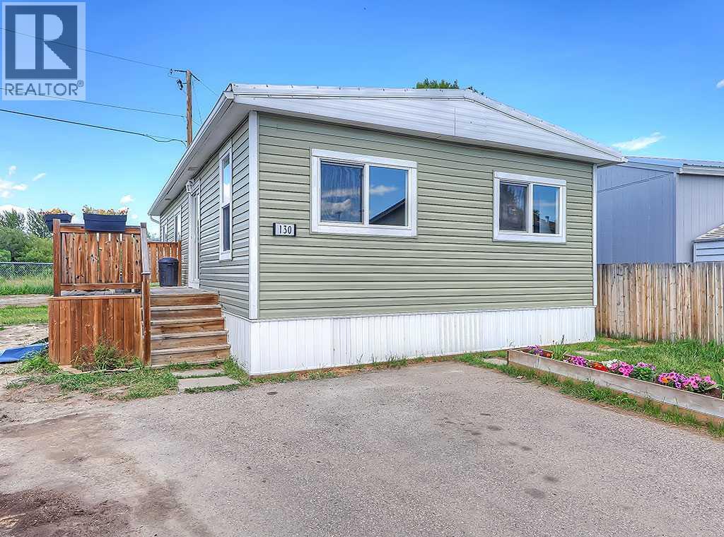 130 Sunset Way Ne, High River, Alberta  T1V 1J4 - Photo 1 - A2237182