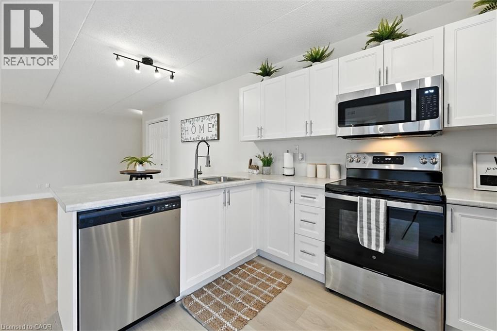 1421 Walkers Line Unit# 102, Burlington, Ontario  L7M 4P4 - Photo 4 - 40766464