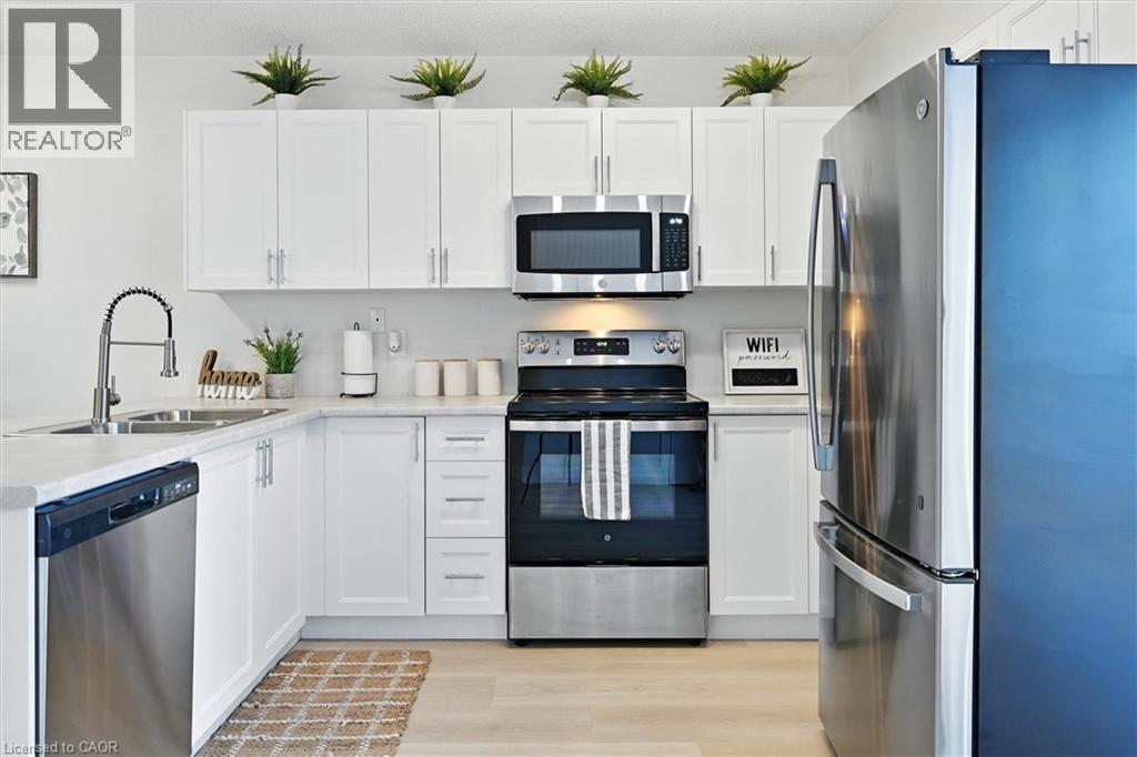 1421 Walkers Line Unit# 102, Burlington, Ontario  L7M 4P4 - Photo 5 - 40766464