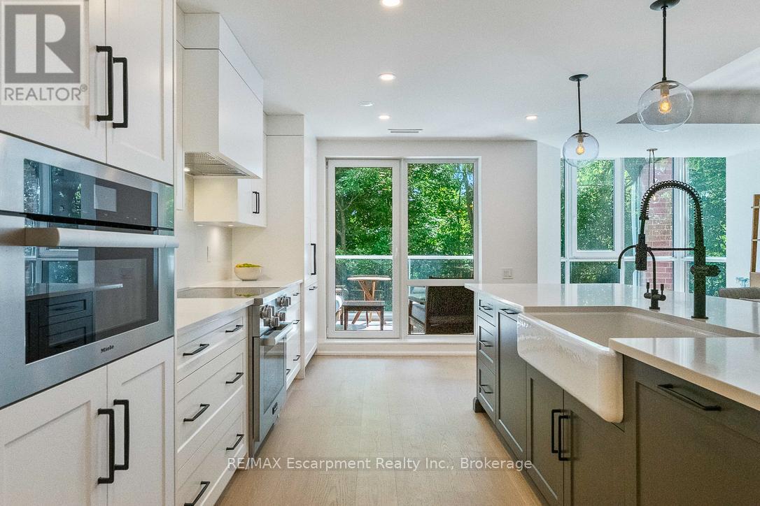 103 - 40 Old Mill Road, Oakville, Ontario  L6J 7W2 - Photo 11 - W12385675