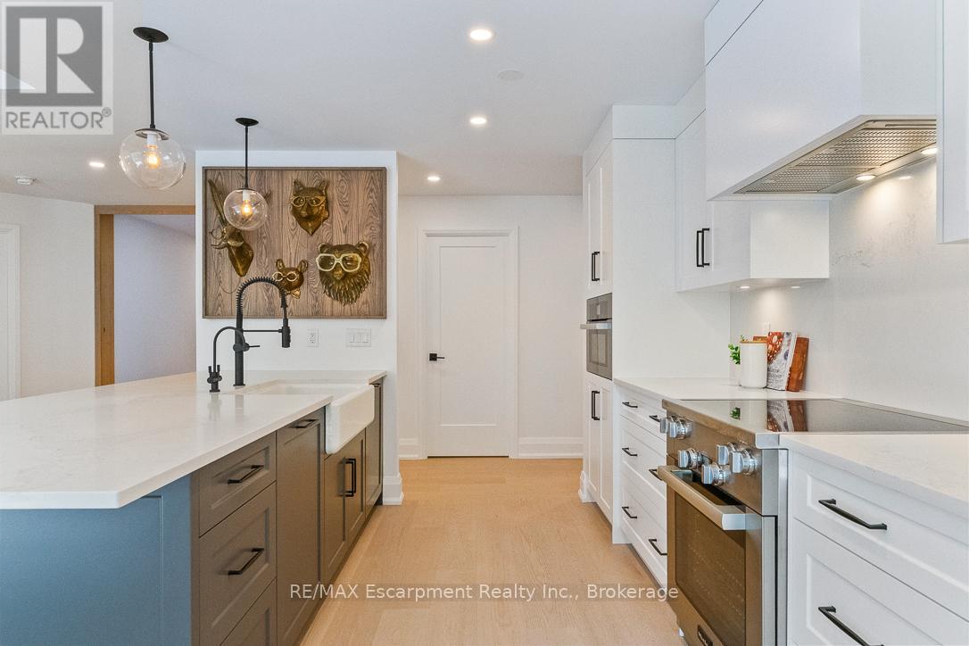 103 - 40 Old Mill Road, Oakville, Ontario  L6J 7W2 - Photo 13 - W12385675