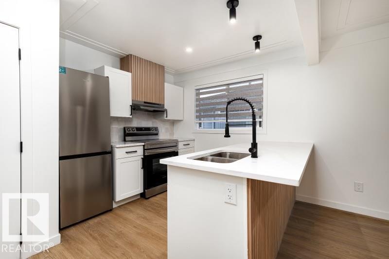 8522/8524 84 Av Nw, Edmonton, Alberta  T6C 1C9 - Photo 12 - E4456477