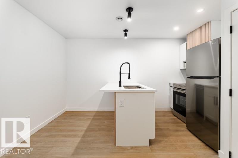 8522/8524 84 Av Nw, Edmonton, Alberta  T6C 1C9 - Photo 29 - E4456477