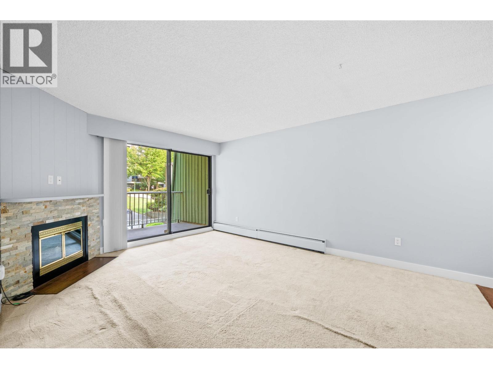 201 3901 Carrigan Court, Burnaby, British Columbia  V3N 4K1 - Photo 2 - R3044368