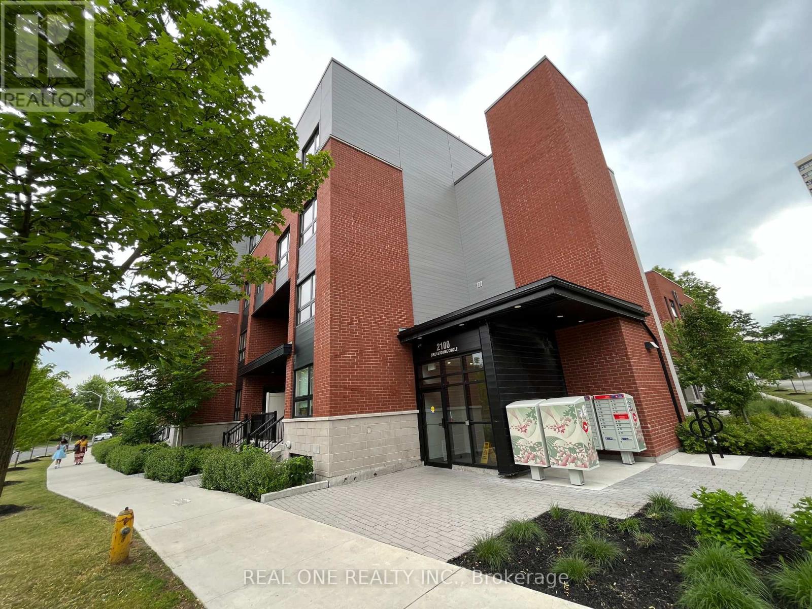 318 - 2100 Bridletowne Circle, Toronto (L'amoreaux), Ontario  M1W 2L1 - Photo 2 - E12385903