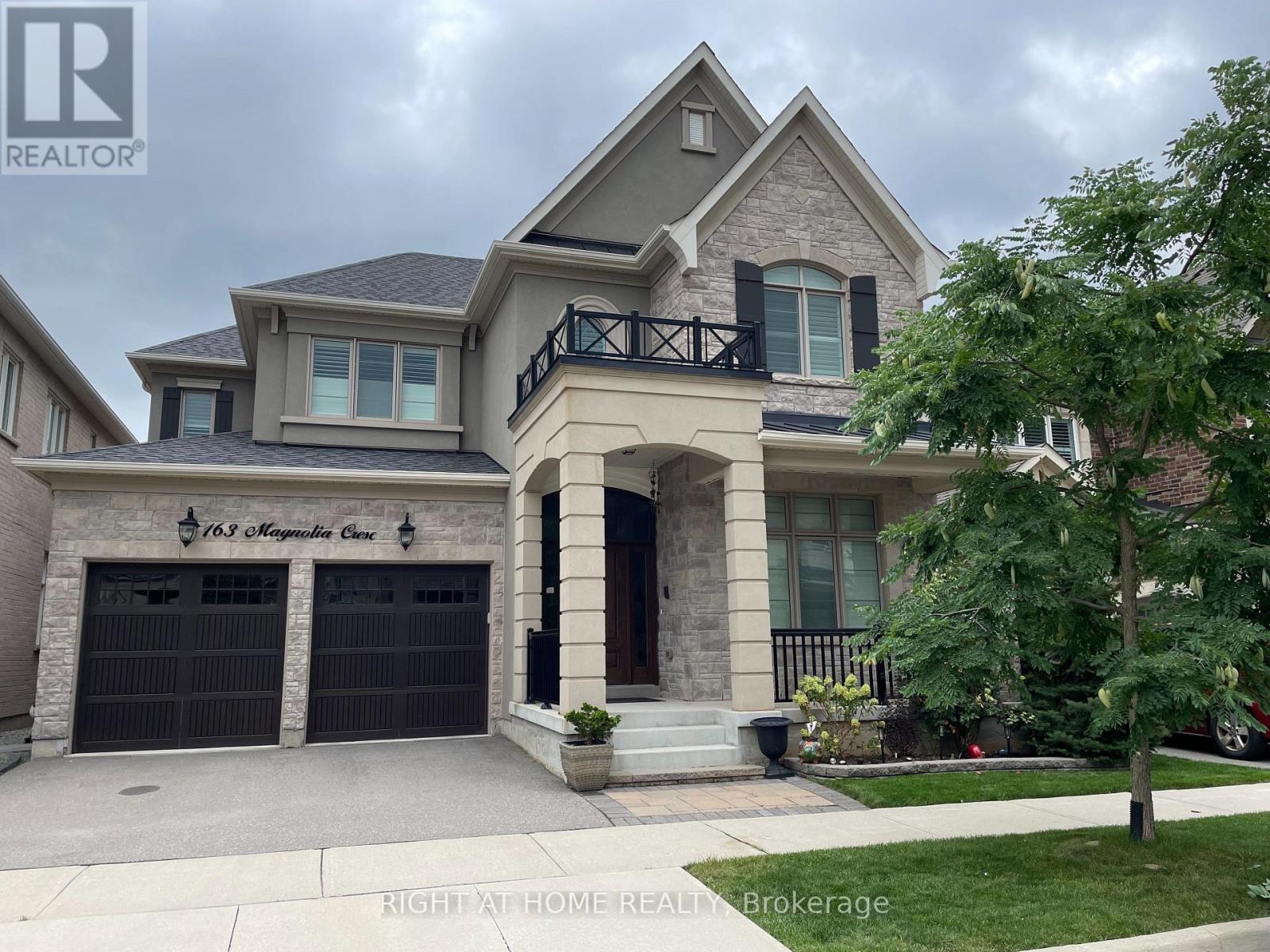 163 Magnolia Crescent, Oakville, Ontario  L6M 0Z8 - Photo 1 - W12386049