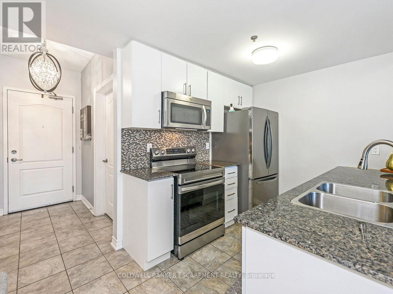 201 - 1419 Costigan Road, Milton, Ontario  L9T 2L4 - Photo 12 - W12386386