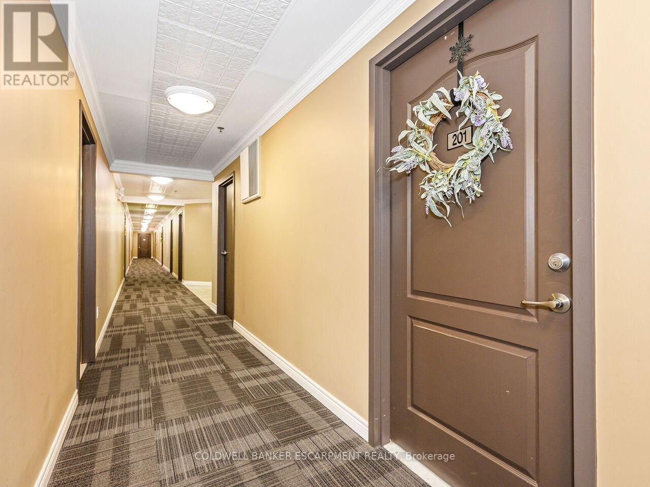 201 - 1419 Costigan Road, Milton, Ontario  L9T 2L4 - Photo 5 - W12386386