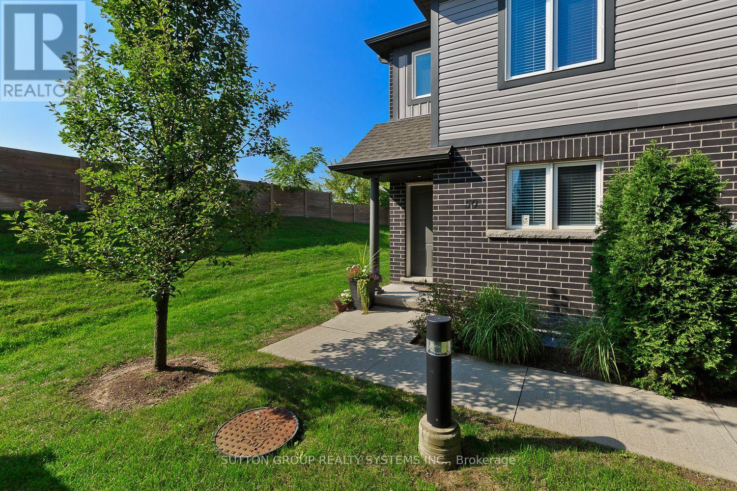 50 - 7768 Ascot Circle, Niagara Falls (Ascot), Ontario  L2H 3P9 - Photo 2 - X12386434