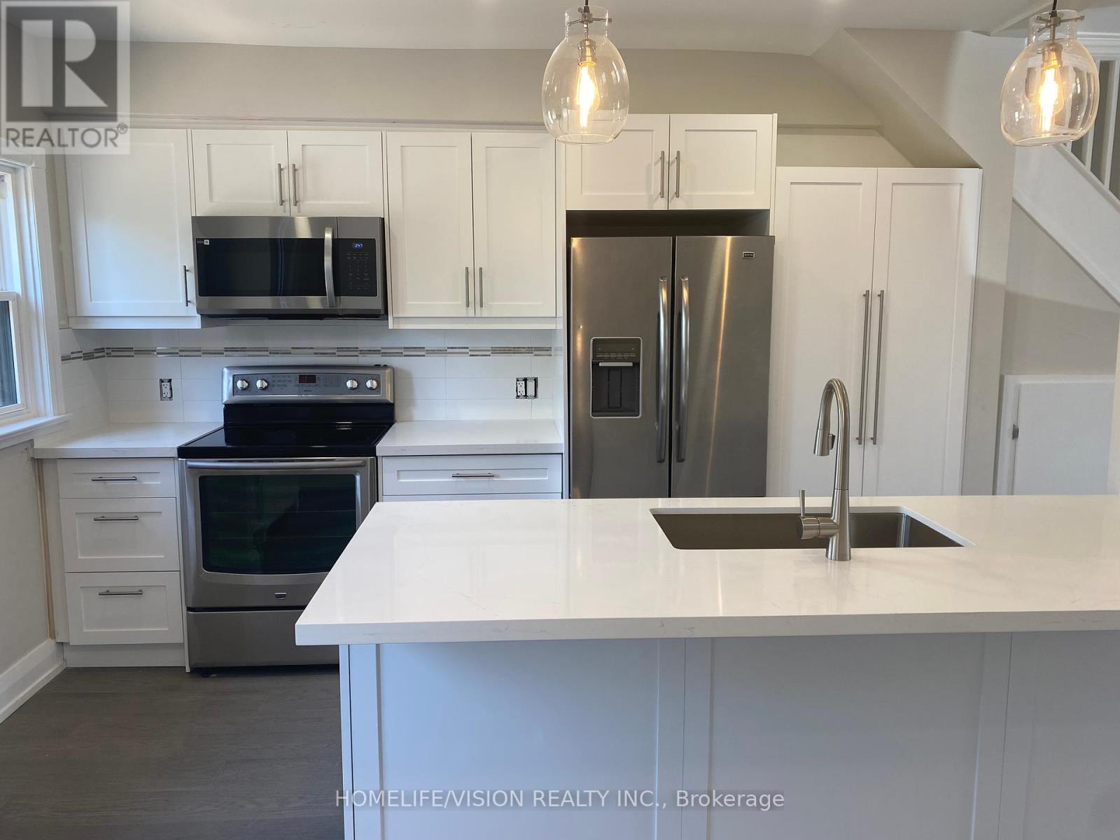 Upper - 2448 Gerrard Street E, Toronto, Ontario  M4E 2E9 - Photo 4 - E12386580