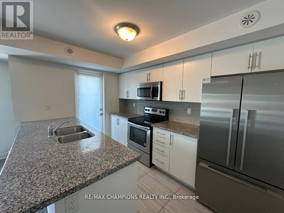 28 - 100 Dufay Road, Brampton, Ontario  L7A 4S3 - Photo 6 - W12386665