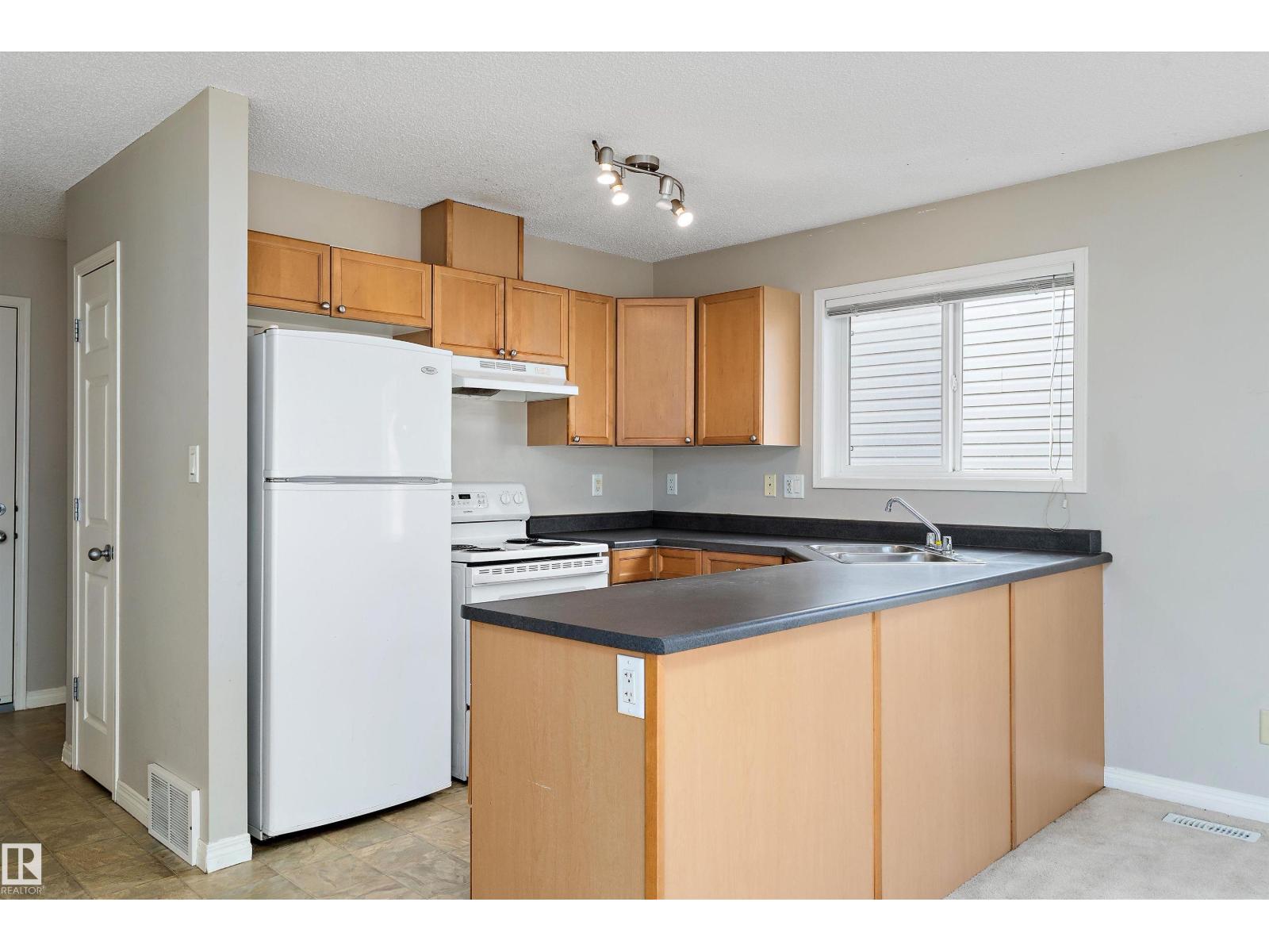#6 130 Hyndman Cr Nw, Edmonton, Alberta  T5A 0E8 - Photo 13 - E4456601