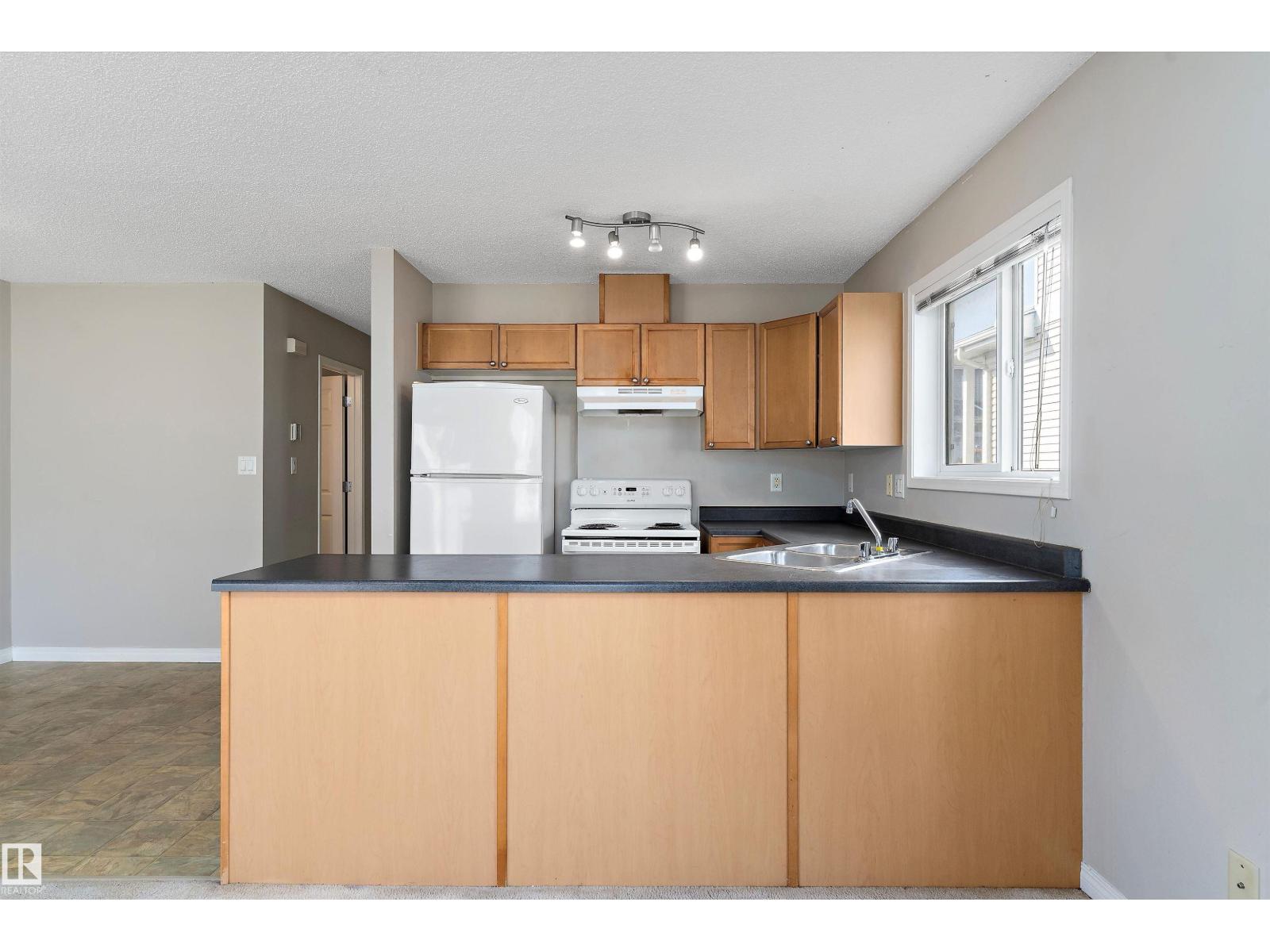 #6 130 Hyndman Cr Nw, Edmonton, Alberta  T5A 0E8 - Photo 16 - E4456601