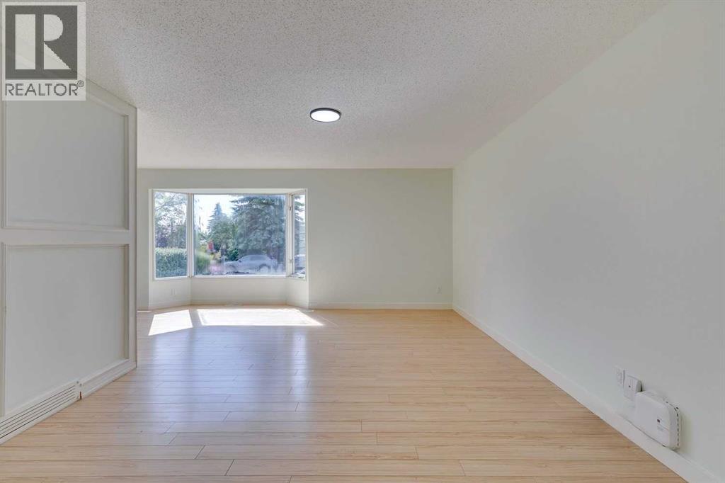 411 Rundleson Place Ne, Calgary, Alberta  T1Y 3H6 - Photo 4 - A2242967