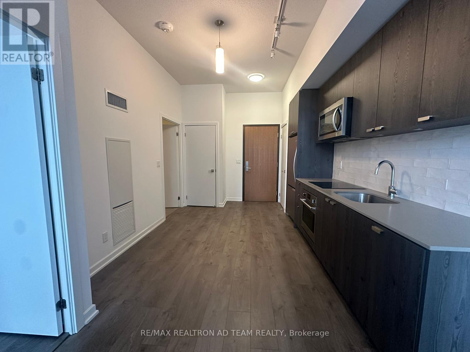 202 - 56 Forest Manor Road, Toronto (Henry Farm), Ontario  M2J 1M1 - Photo 7 - C12383498