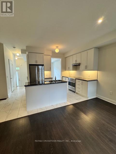 19 Tarmola Park Court, Toronto, Ontario  M9L 0A6 - Photo 7 - W12387091