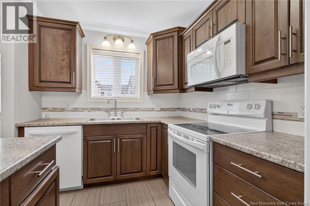 331 Mclaughlin Drive Unit# 8, Moncton, New Brunswick  E1A 4R3 - Photo 3 - NB121750
